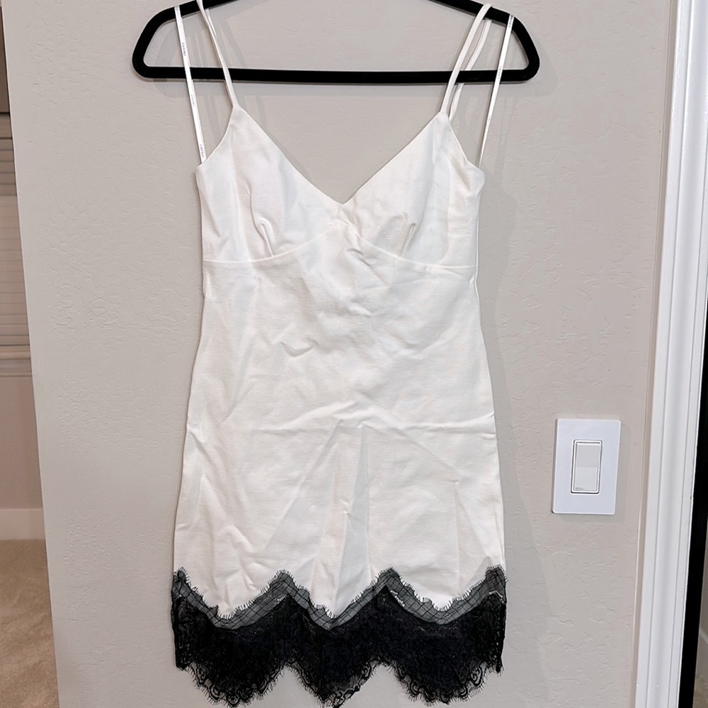 White dress with sexy black lace trim